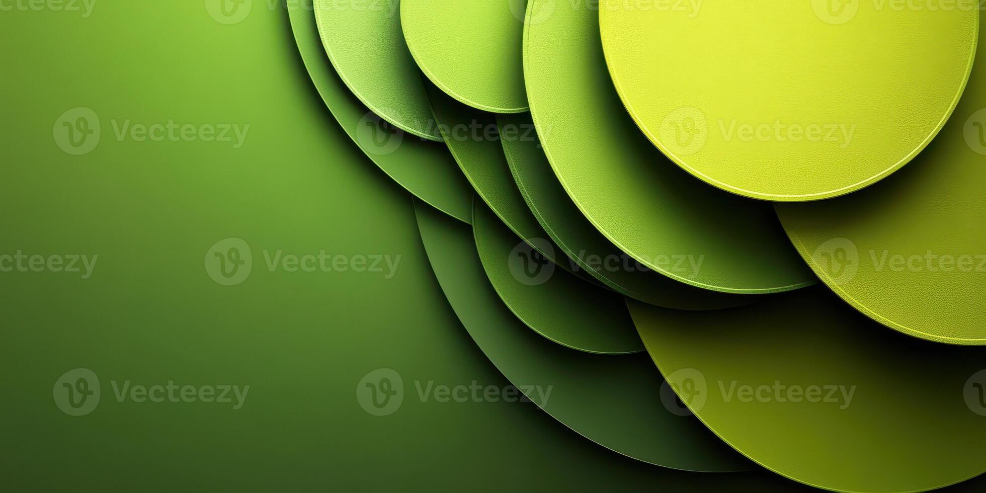 Green abstract design featuring layered circular shapes on a smooth background with varying shades and textures photo