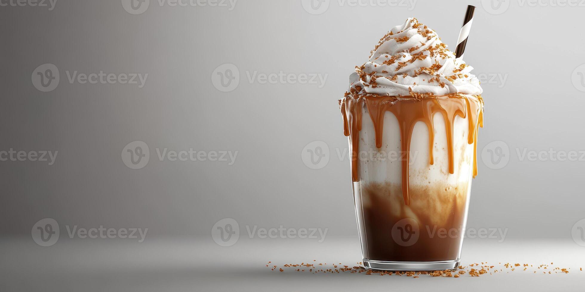 Rich caramel dessert beverage topped with whipped cream and caramel drizzle served in a glass photo