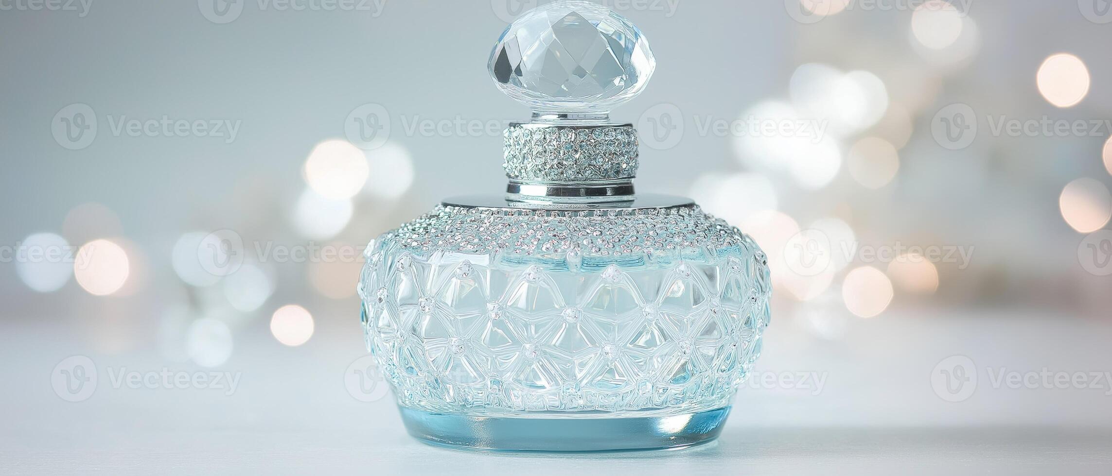 Elegant Glass Perfume Bottle With Bokeh photo