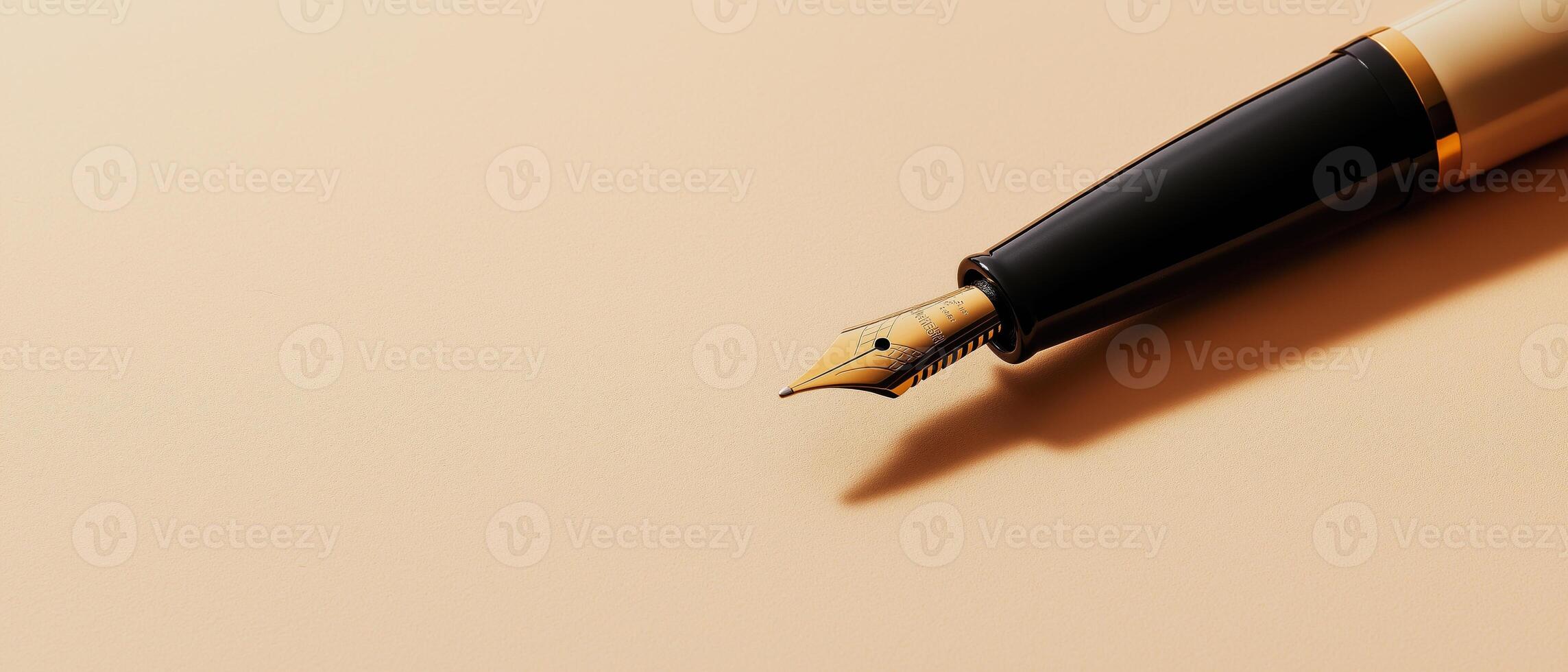 Fountain Pen Nib Close-Up On Paper photo