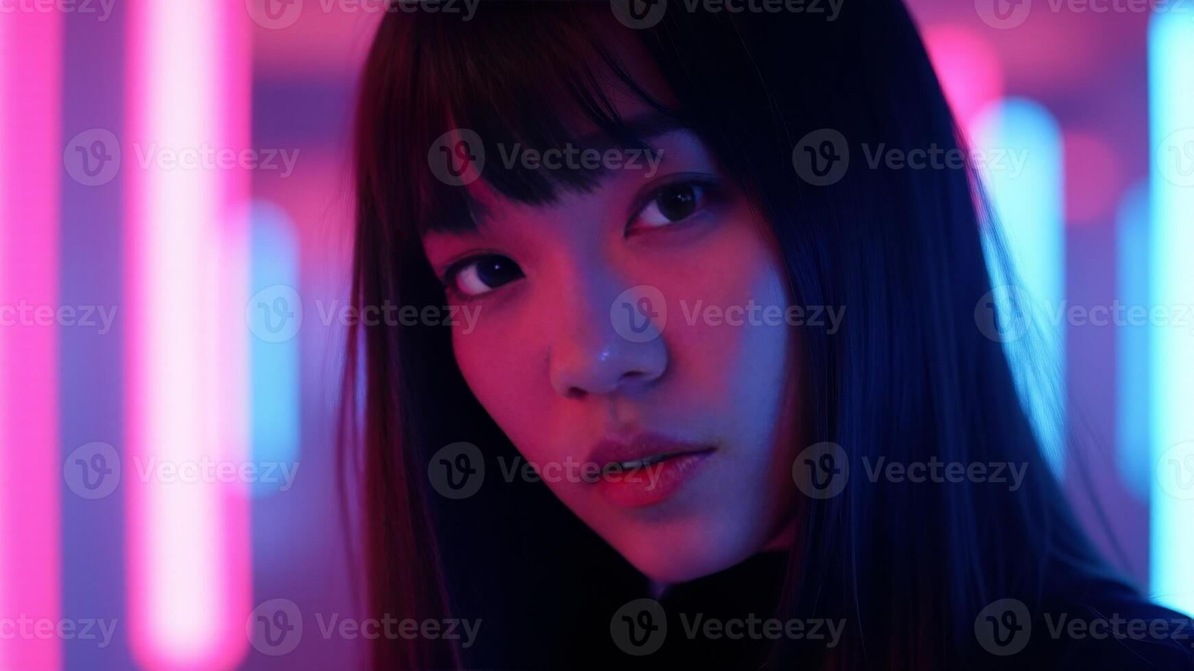 Asian Woman Under Neon Lights Portrait photo
