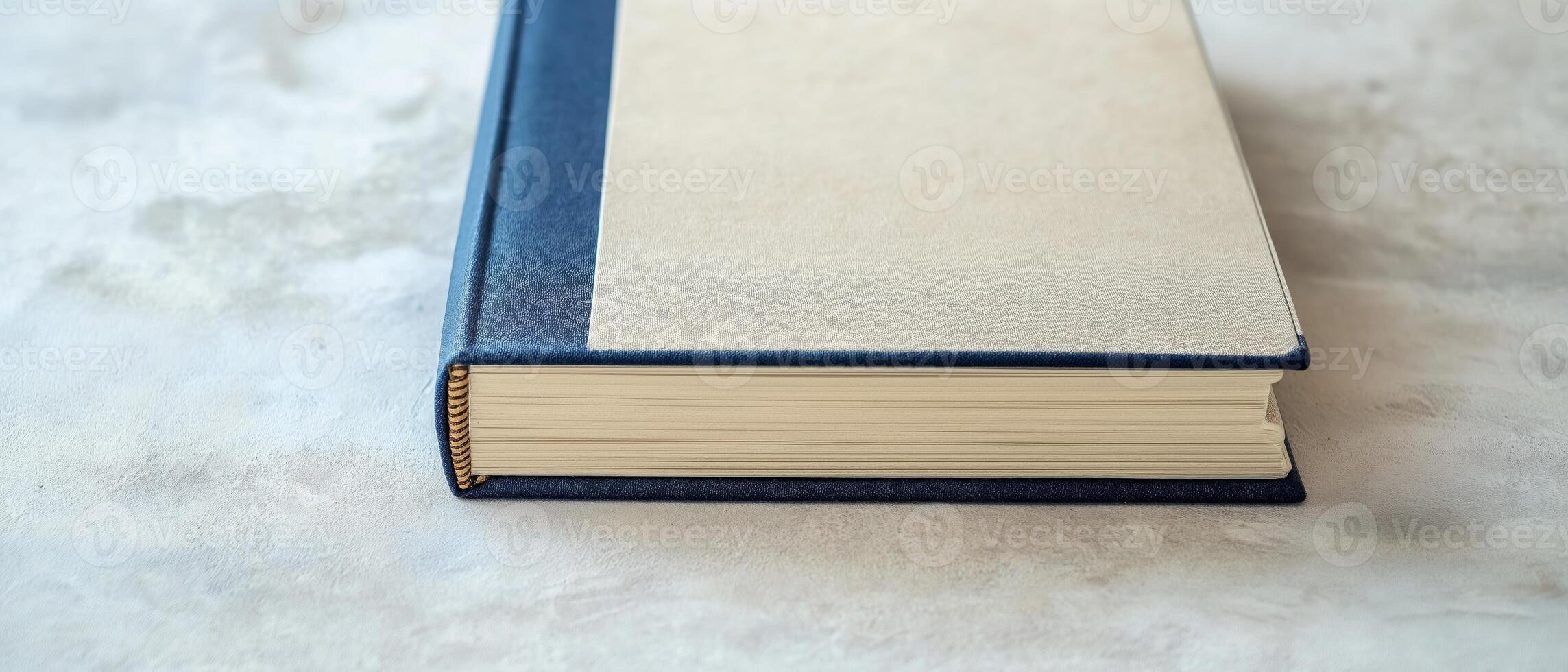 Closed Hardcover Book On White Surface photo