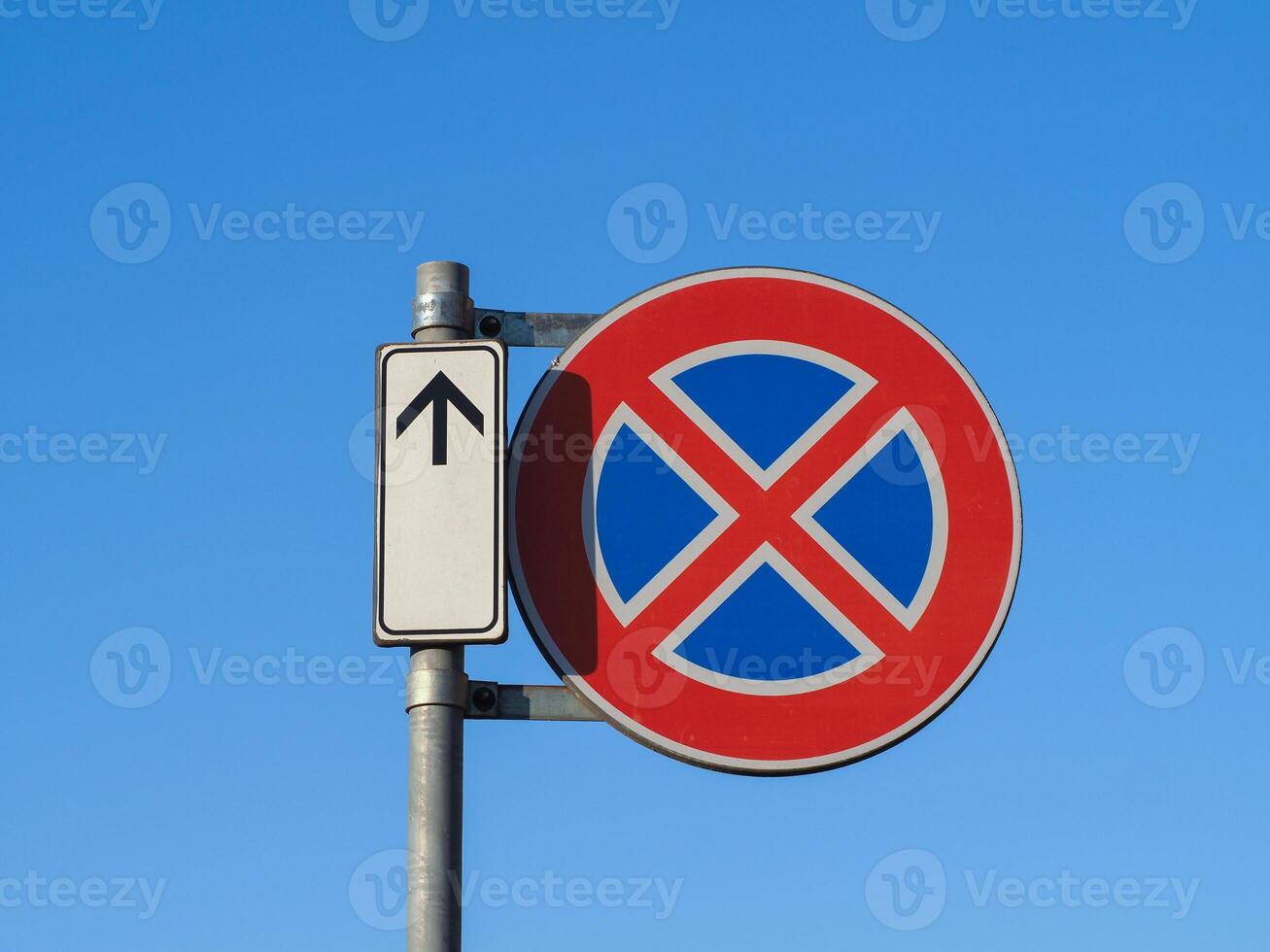 no parking no stopping sign photo
