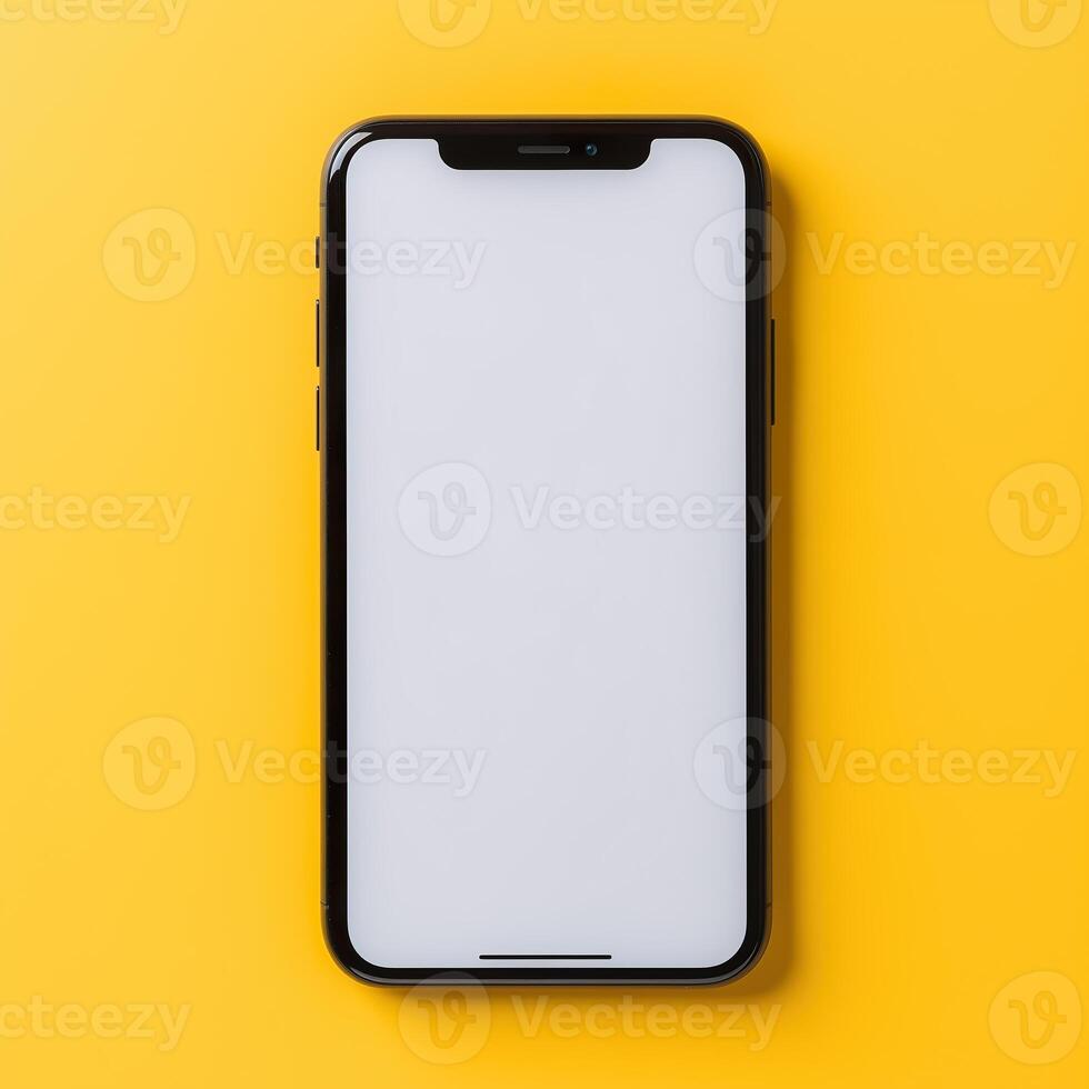 Blank smartphone on yellow background photo