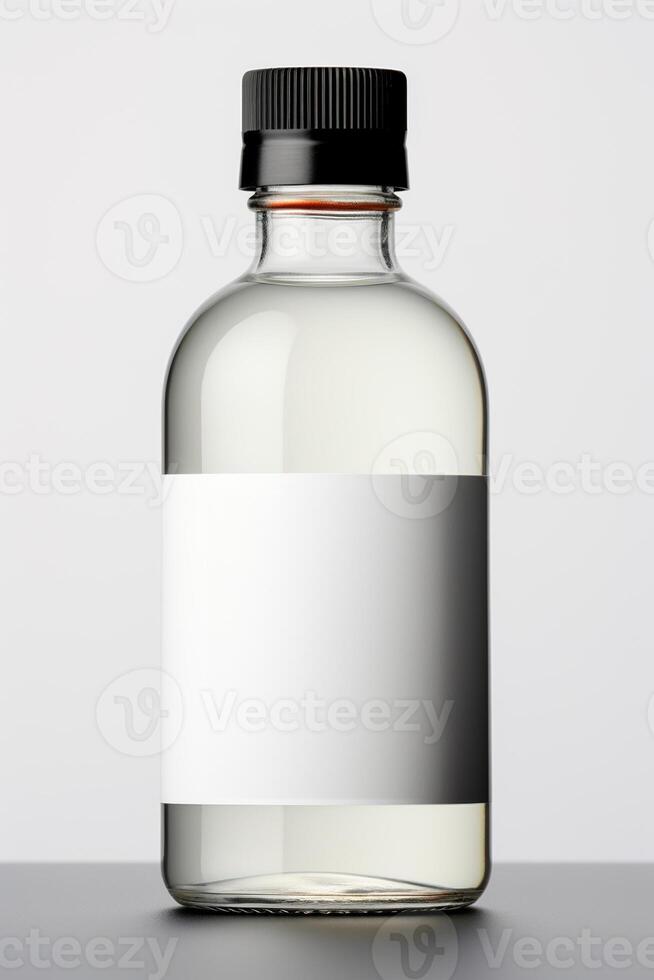 A white bottle with a blank label on it photo