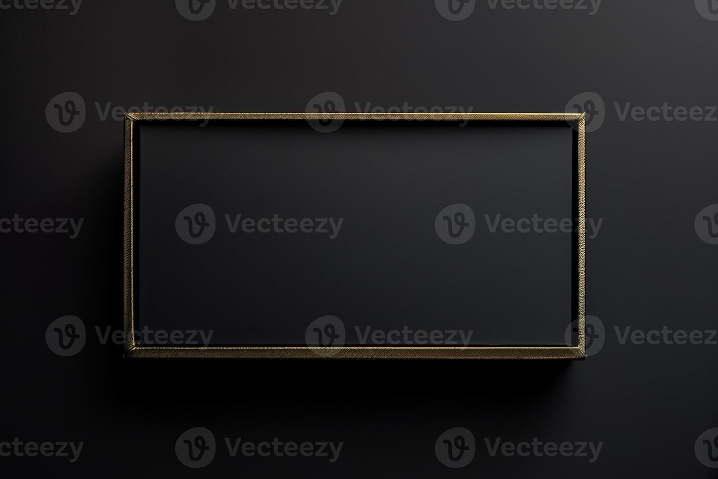 Gold frame on black background photo