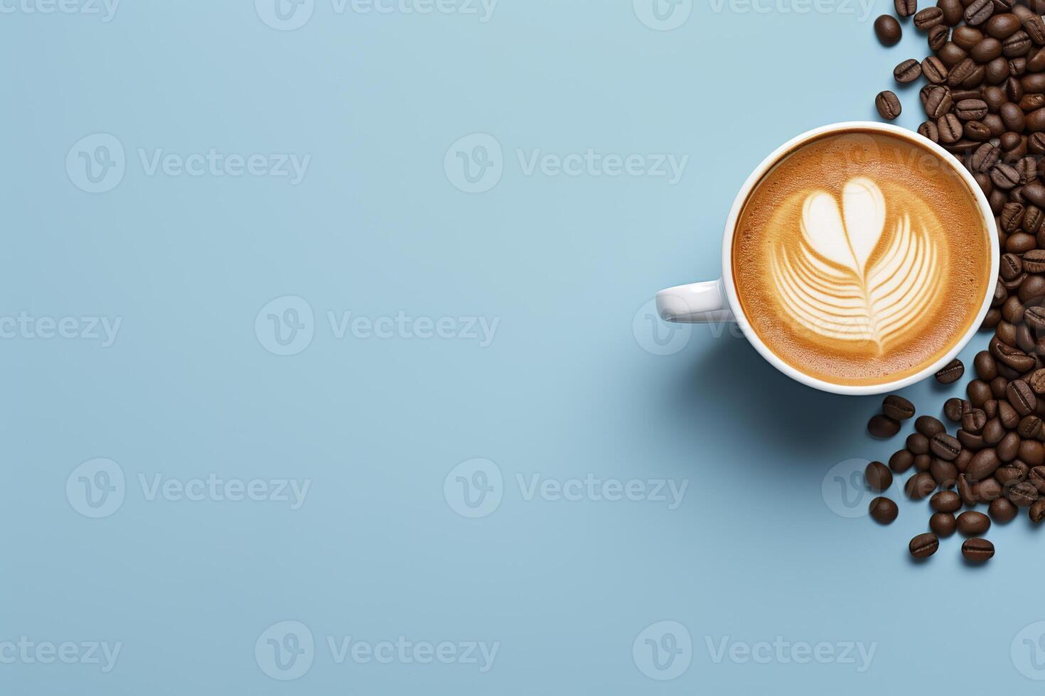Coffee beans and latte art on blue background top view photo