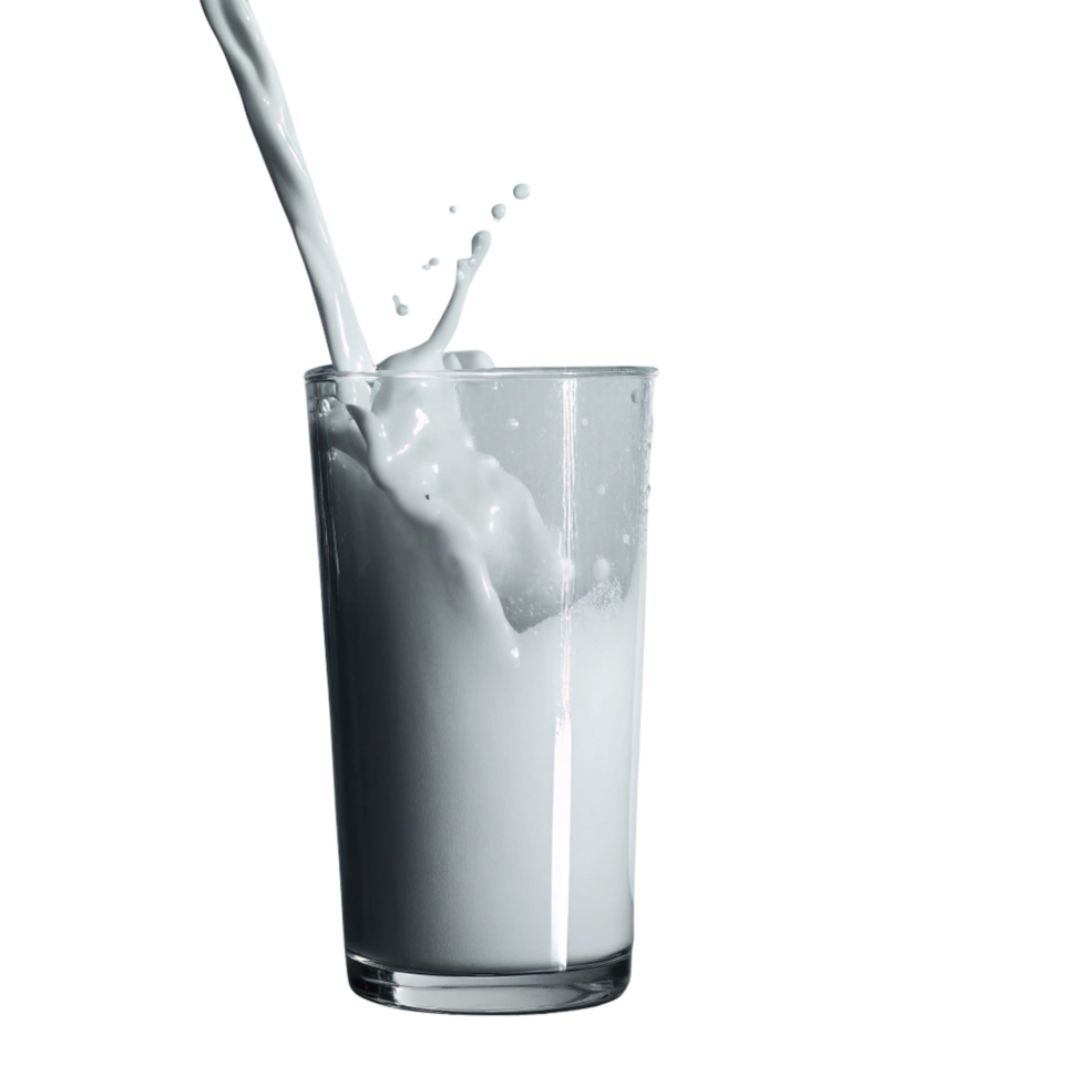 Milk pouring into a glass with splash and crown effect on black background png