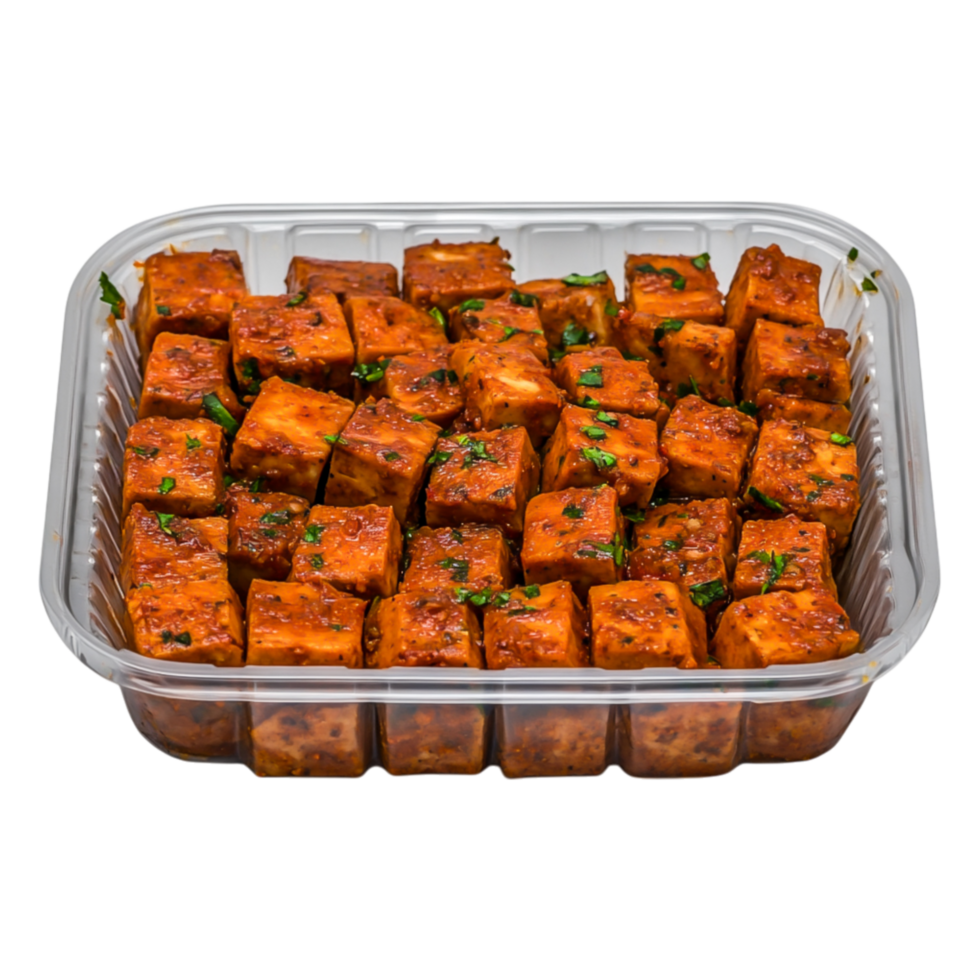 Delicious Spicy Marinated Tofu Cubes in Plastic Container Ready to Serve png