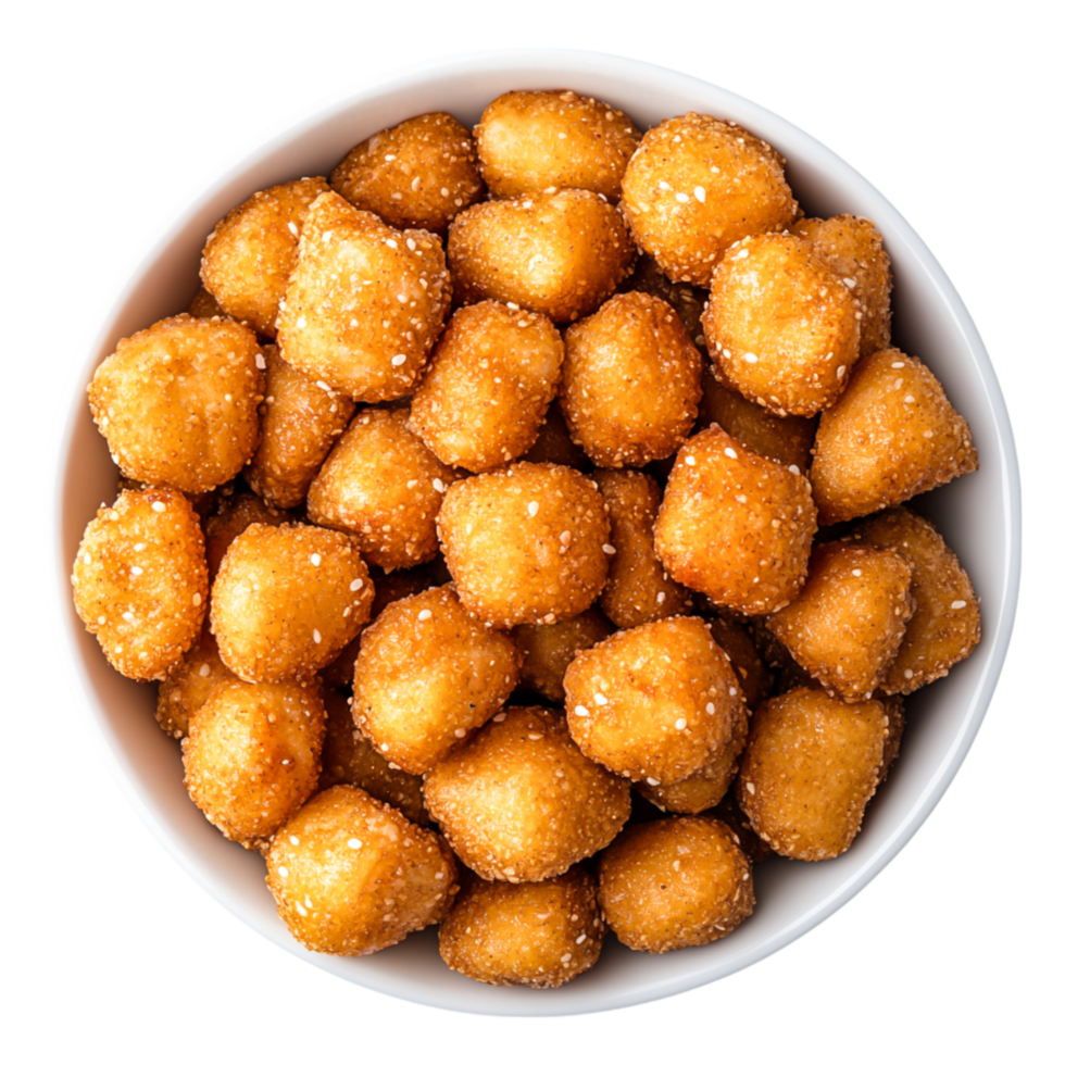 Golden Brown Bite-Sized Snacks in a White Bowl Wooden Table png