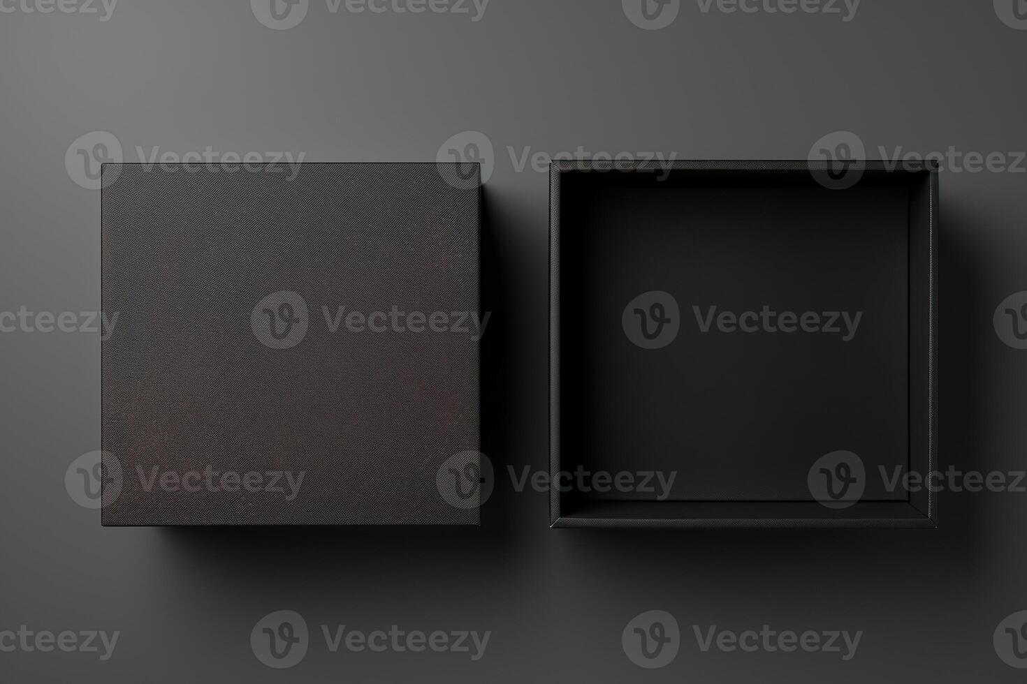 Two empty black boxes on a gray background photo