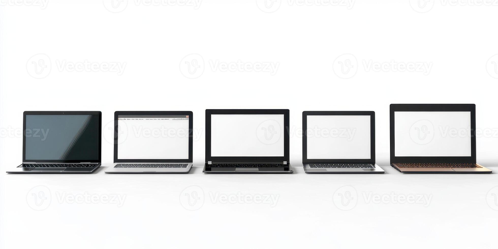 Multiple laptops arranged in a row on a minimalist desk showcasing various styles and colors in a clean workspace setting photo