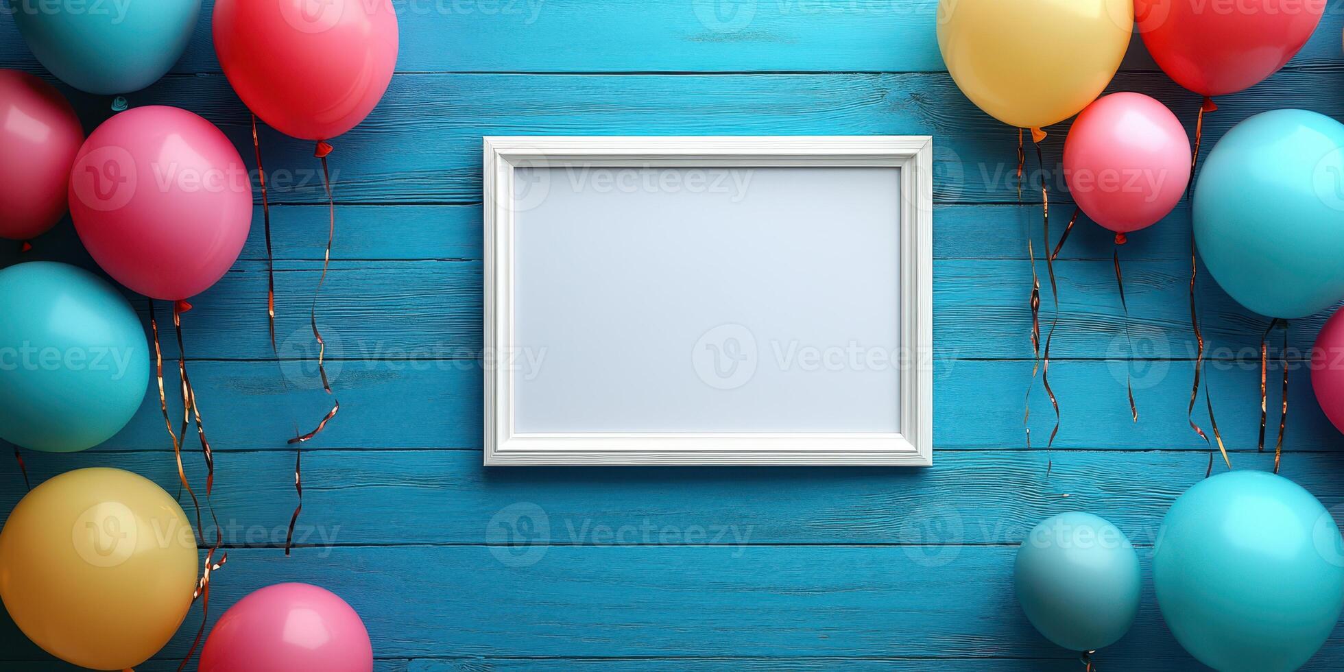 Colorful balloons surround an empty frame on a bright blue wooden surface ready for a celebration or event photo