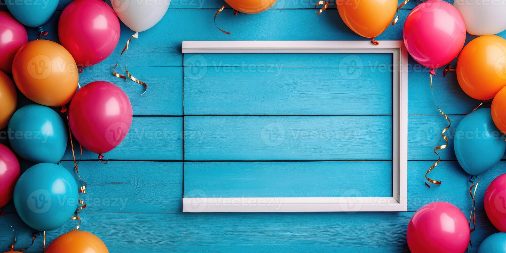 Colorful balloons surrounding an empty white frame on a bright blue wooden background for celebrations and events photo