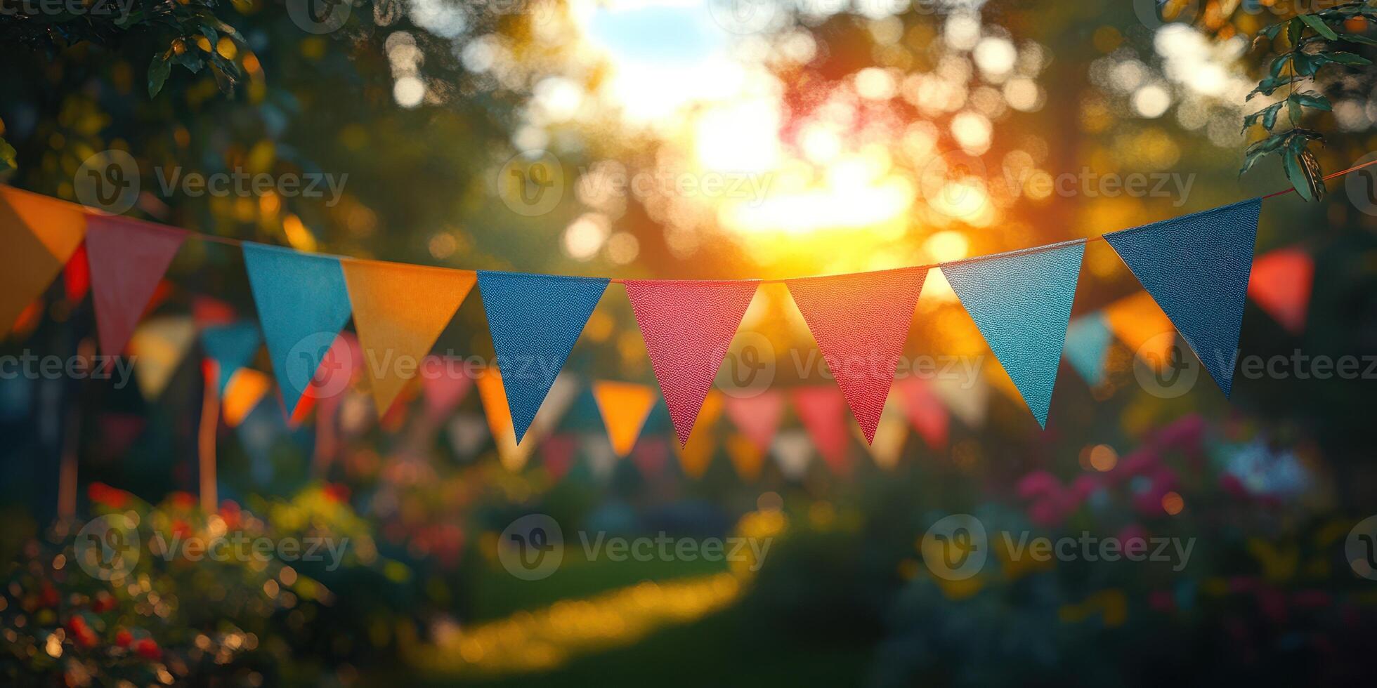 Colorful flags create a festive atmosphere in a sunlit garden during a summer celebration photo
