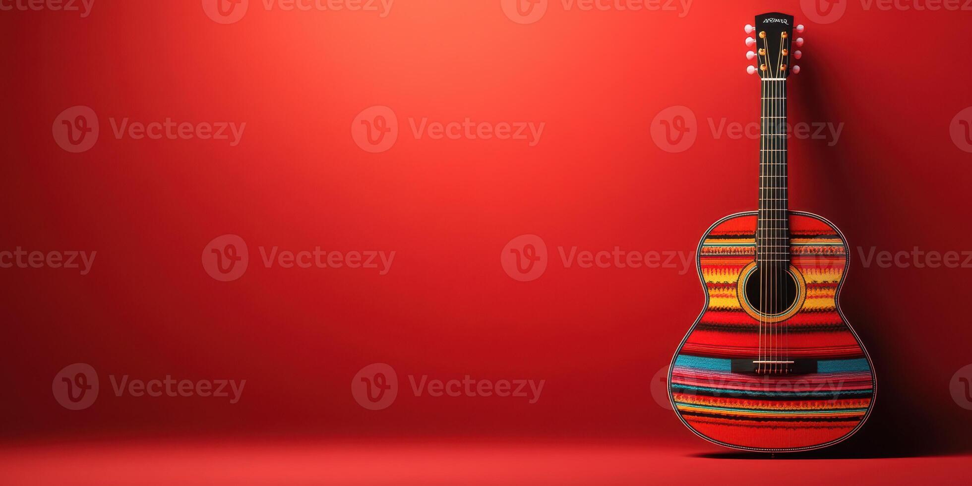 Colorful acoustic guitar decorated with traditional patterns against a vibrant red background showcases craftsmanship and culture photo
