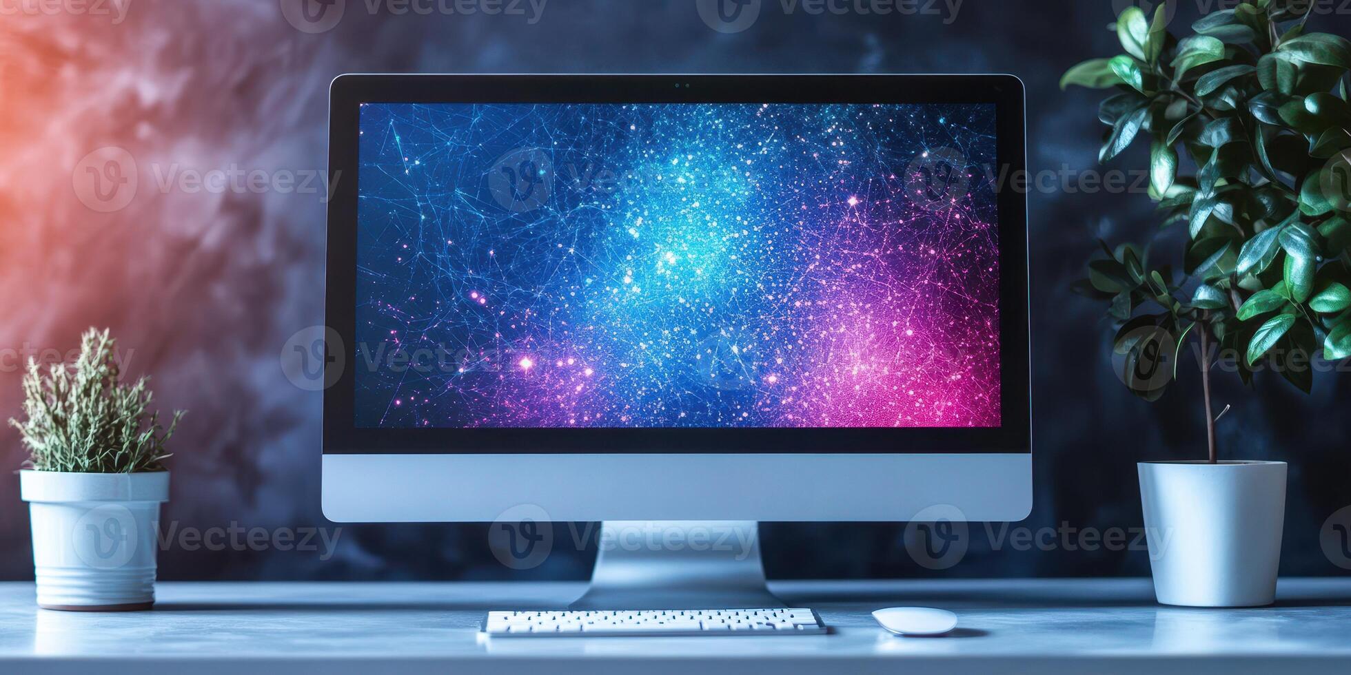 Colorful abstract digital background displayed on a computer monitor with plants on a desk in a modern workspace photo