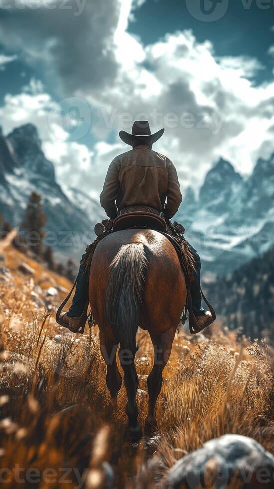 Cowboy rides horseback through mountainous terrain under dramatic sky during late afternoon photo