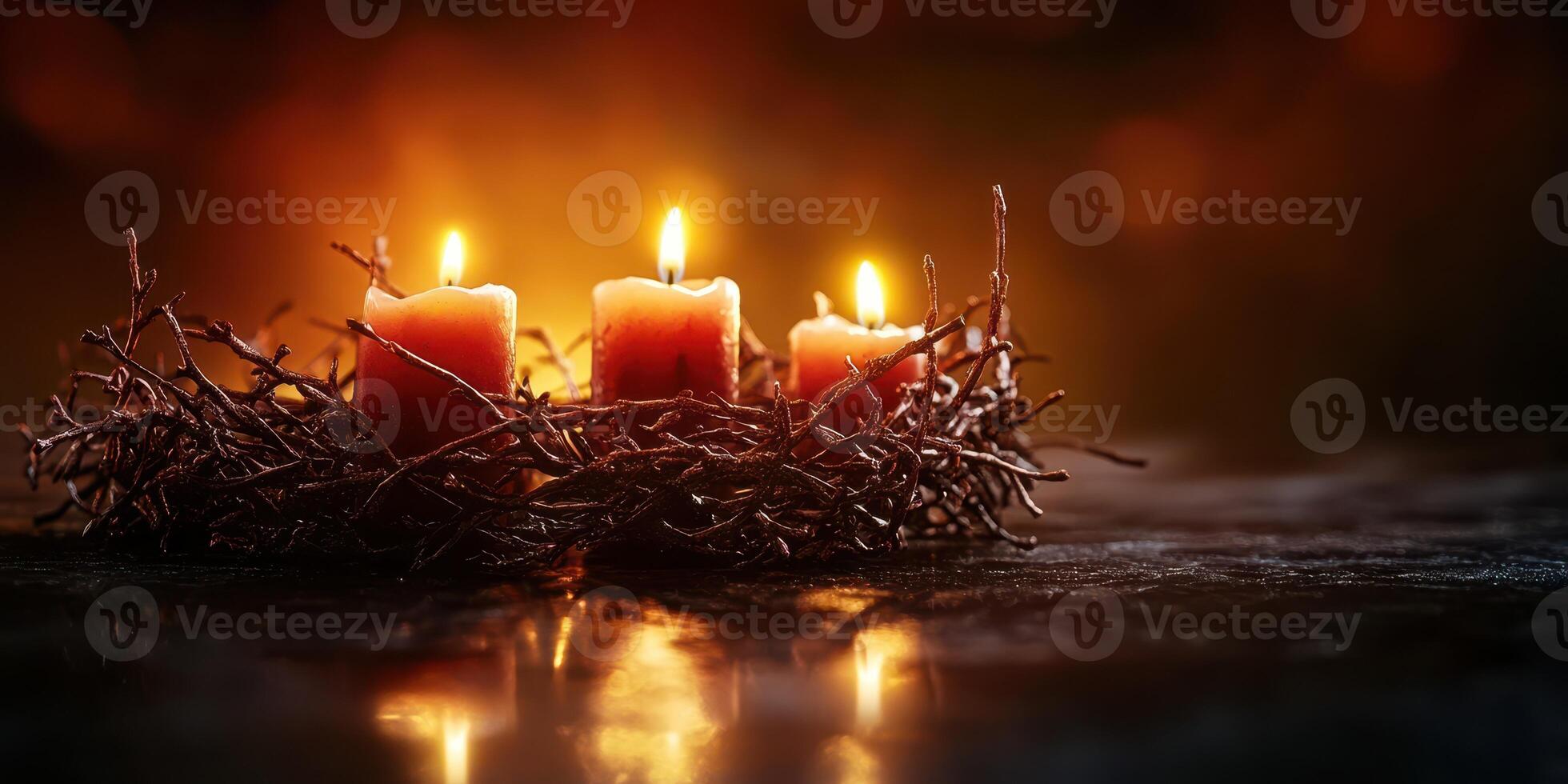 Warm glow of red candles nestled in twigs creates a cozy ambiance in a dimly lit setting photo