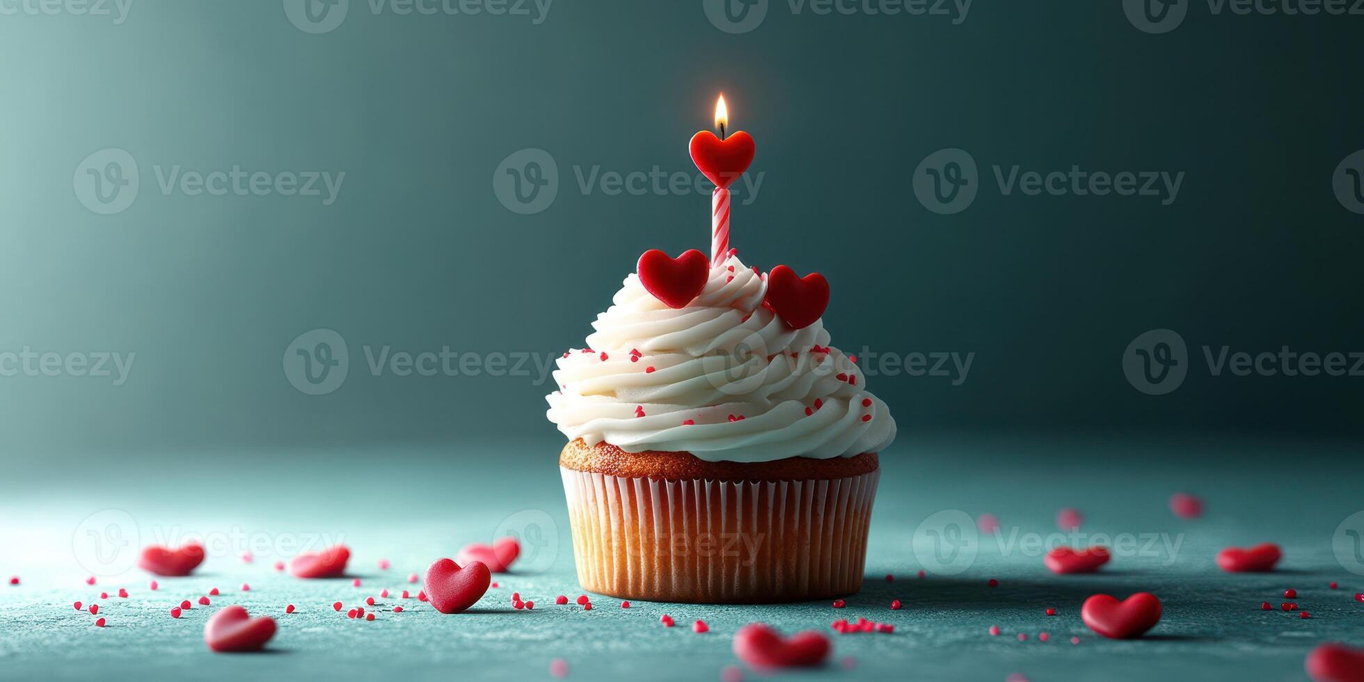 Cupcake decorated with heart shapes and a candle for a celebration in a cozy setting photo