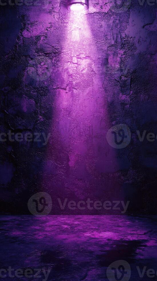 Vibrant purple light illuminates a textured wall in a dark, atmospheric setting photo