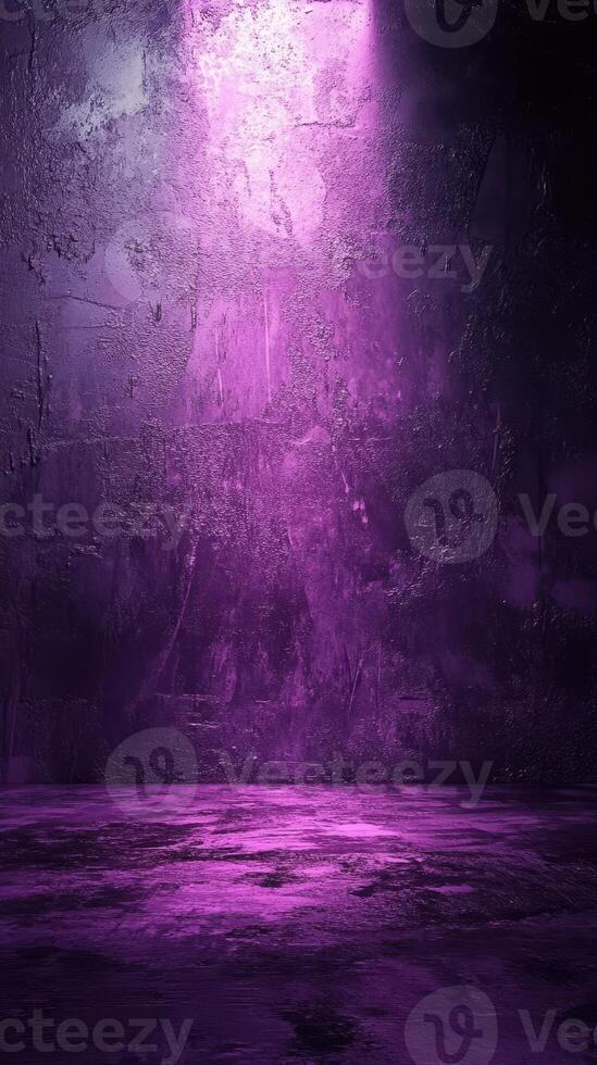 Vibrant purple textured backdrop with dramatic lighting creating an artistic atmosphere for creative endeavors photo