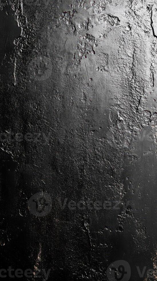 Dark textured surface with a rough finish creating an abstract background ideal for design projects and artistic expressions photo