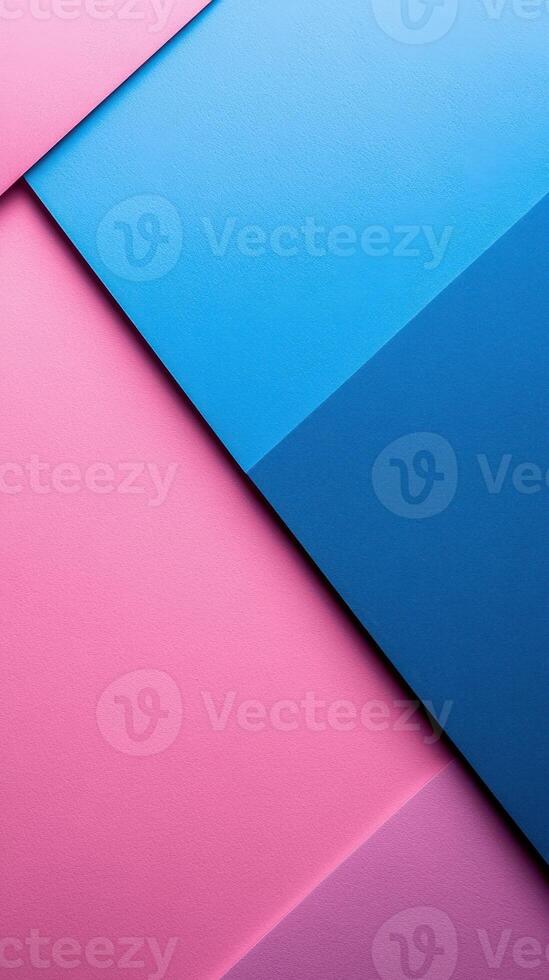 Colorful geometric shapes in pink and blue paper create an abstract arrangement in a modern design setting photo