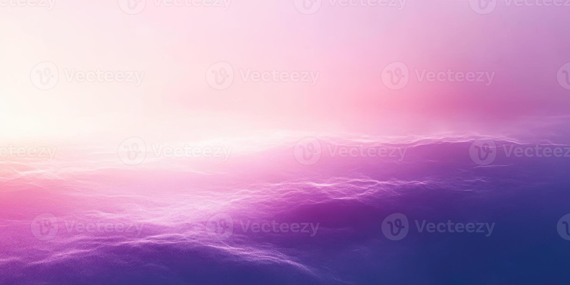 Beautiful sunset over endless ocean waves with a gradient of purple and pink hues illuminating the sky at dusk photo