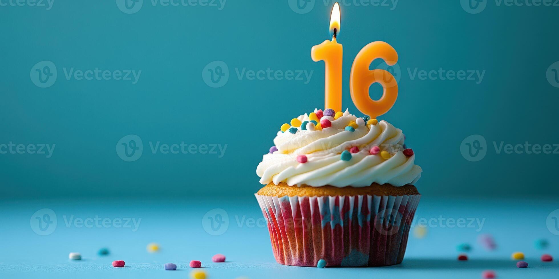 Celebrating a sweet sixteen birthday with a colorful cupcake topped with frosting and a candle photo
