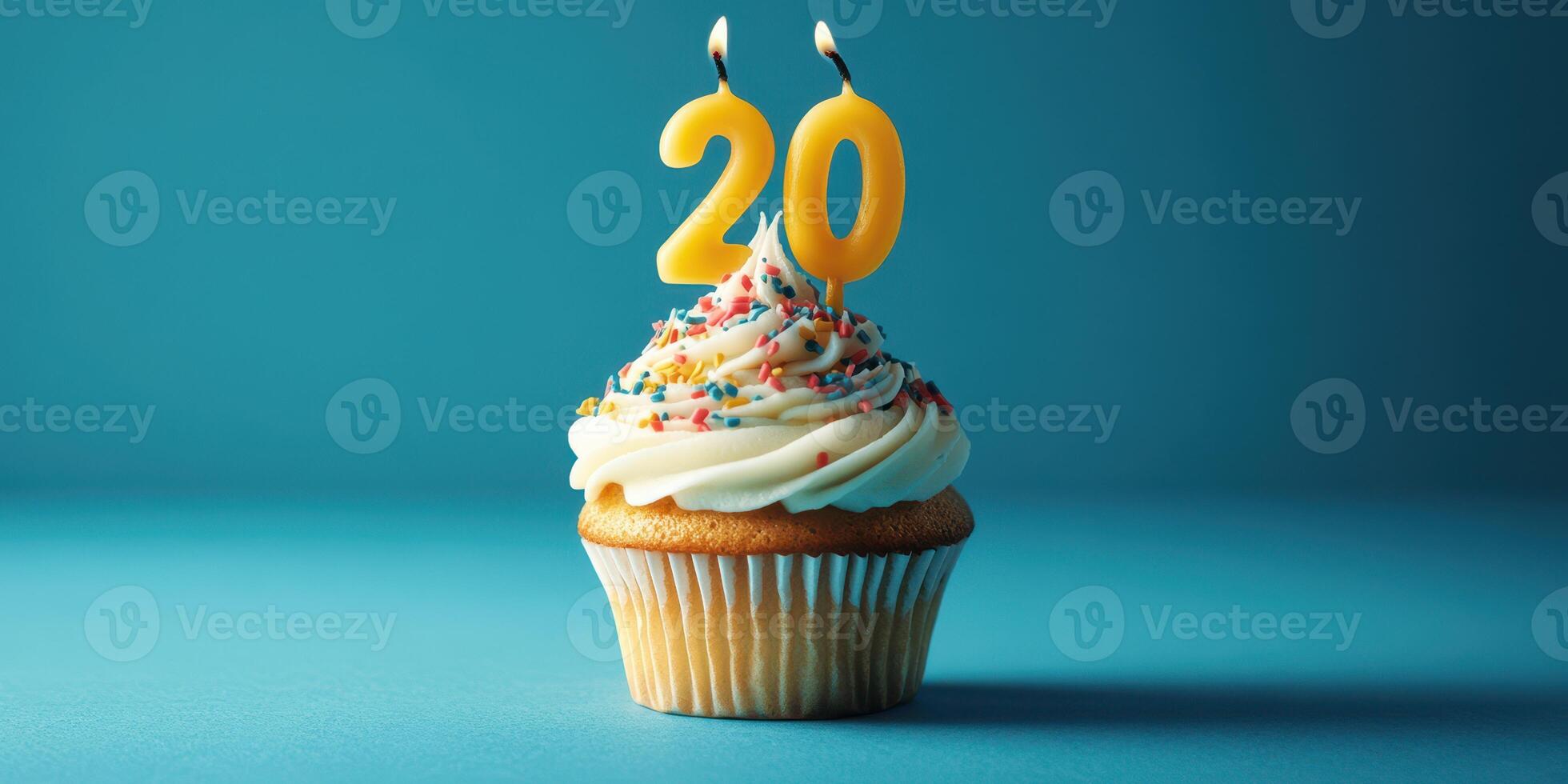 Celebrating a milestone with a colorful cupcake topped with a sparkling 20 candle in a festive atmosphere photo