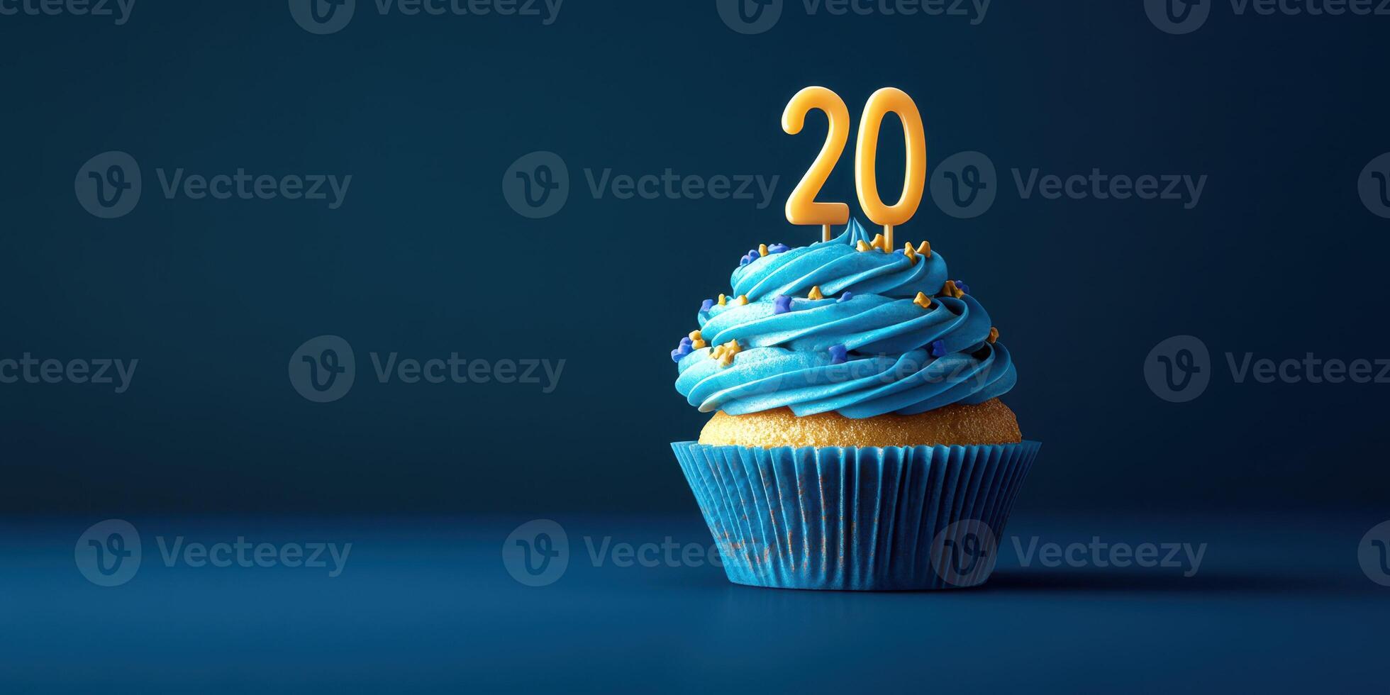 Delightful blue cupcake featuring a yellow number twenty candle, perfect for celebrating a special birthday occasion photo