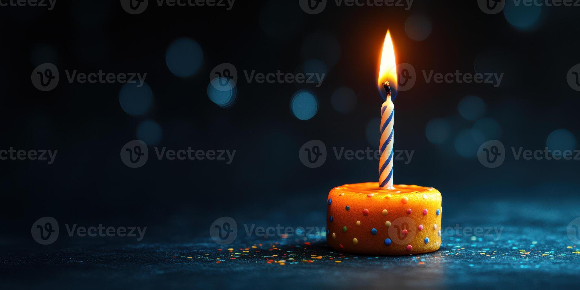 Bright candle flickers on top of a festive dessert against a dark background creating a warm celebration atmosphere photo