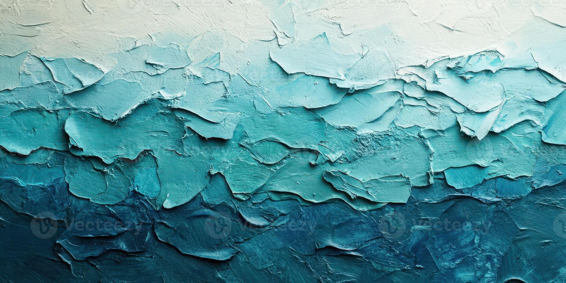 Textured abstract artwork featuring shades of blue and green created through layered techniques in an artist's studio photo