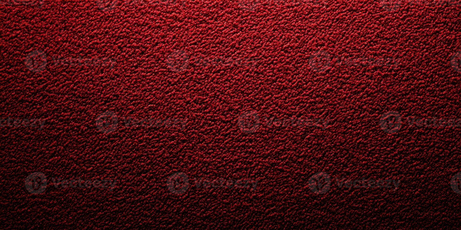 Textured background in rich red color creates a warm and inviting atmosphere perfect for design projects photo