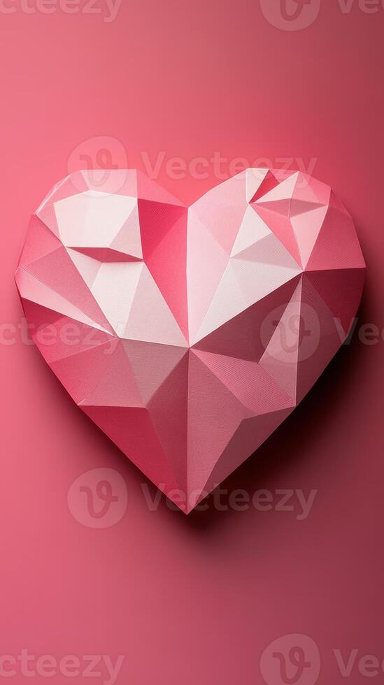 Pink geometric heart artwork displayed against a vivid pink background creating a striking visual effect photo