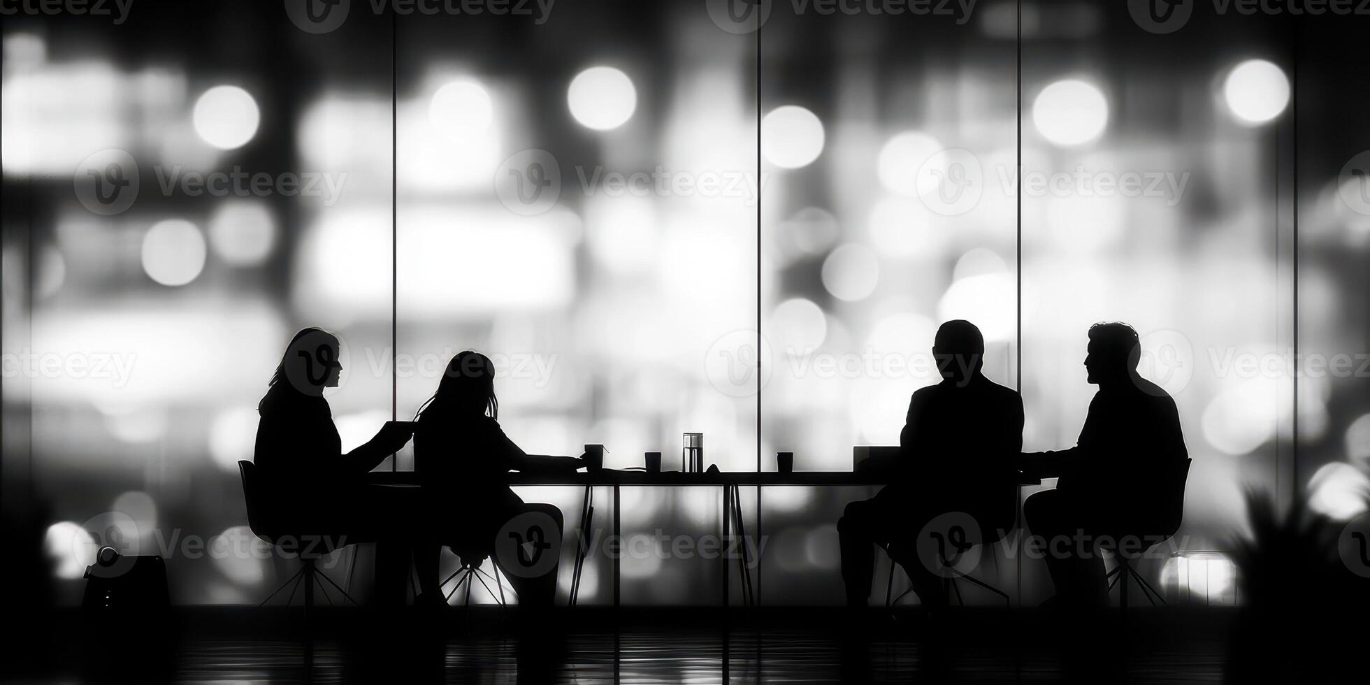 Business meeting with silhouettes in front of a blurred city backdrop during nighttime photo