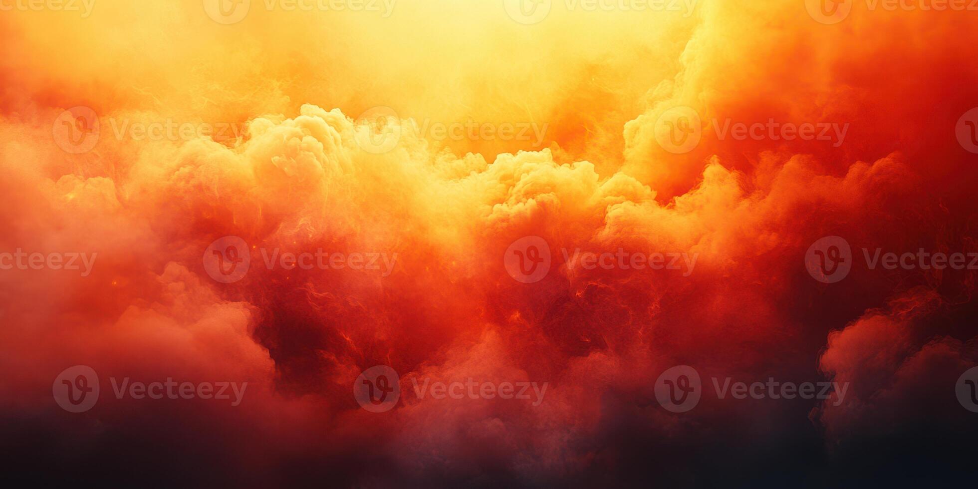Majestic display of vibrant orange and yellow clouds illuminated by the setting sun over a tranquil landscape photo