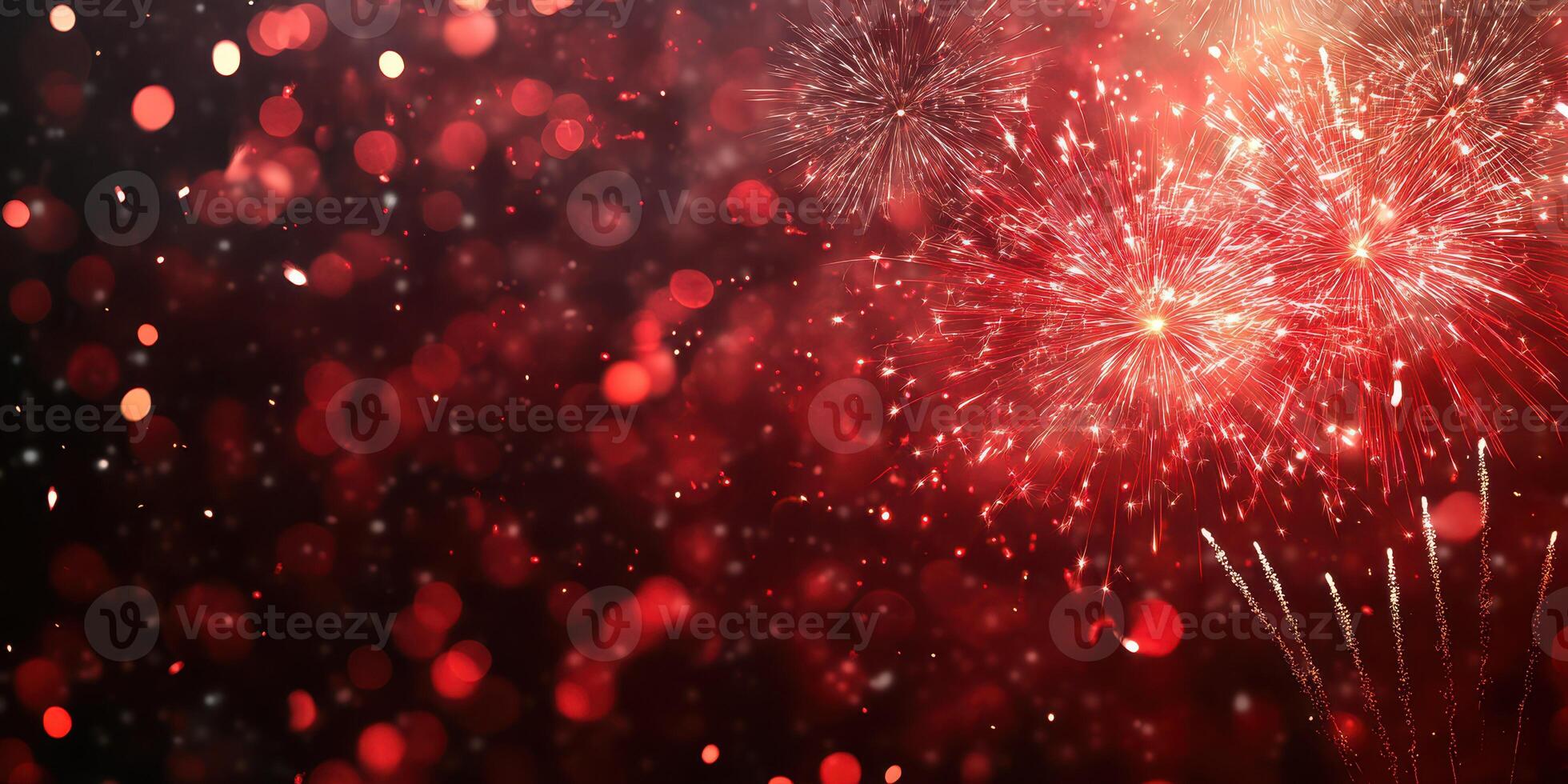 Colorful fireworks burst in the night sky above sparkling red bokeh lights during a festive celebration photo