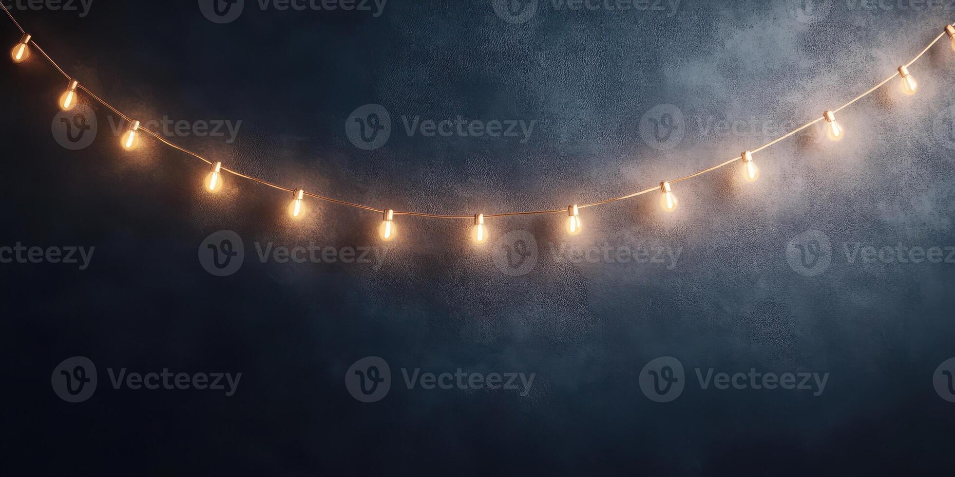 Warm string lights illuminate a darkened space, creating a cozy atmosphere for gatherings and celebrations photo