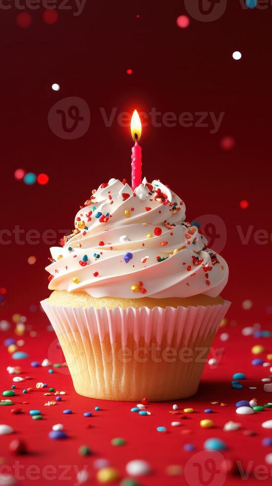 Delicious cupcake with white frosting and a candle surrounded by colorful sprinkles on a festive red background photo