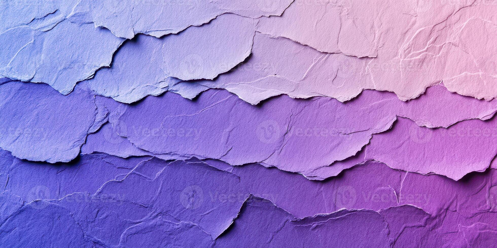 Beautiful layers of textured paper in shades of purple captured in an artistic arrangement photo