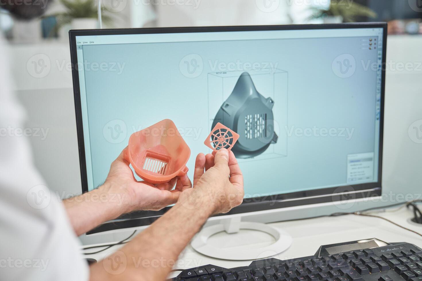 Anonymous engineer with 3D face mask photo