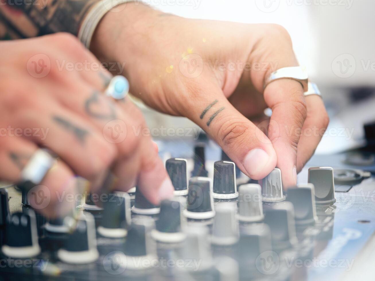 Crop DJ playing music with controller photo