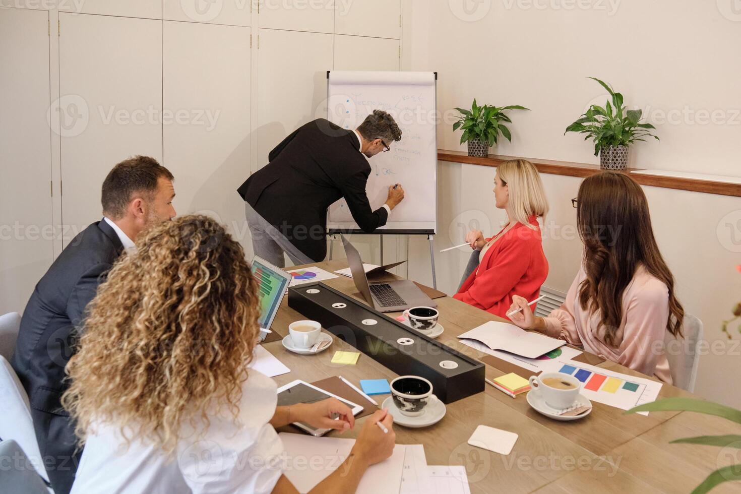 Group of colleagues working in modern workspace photo
