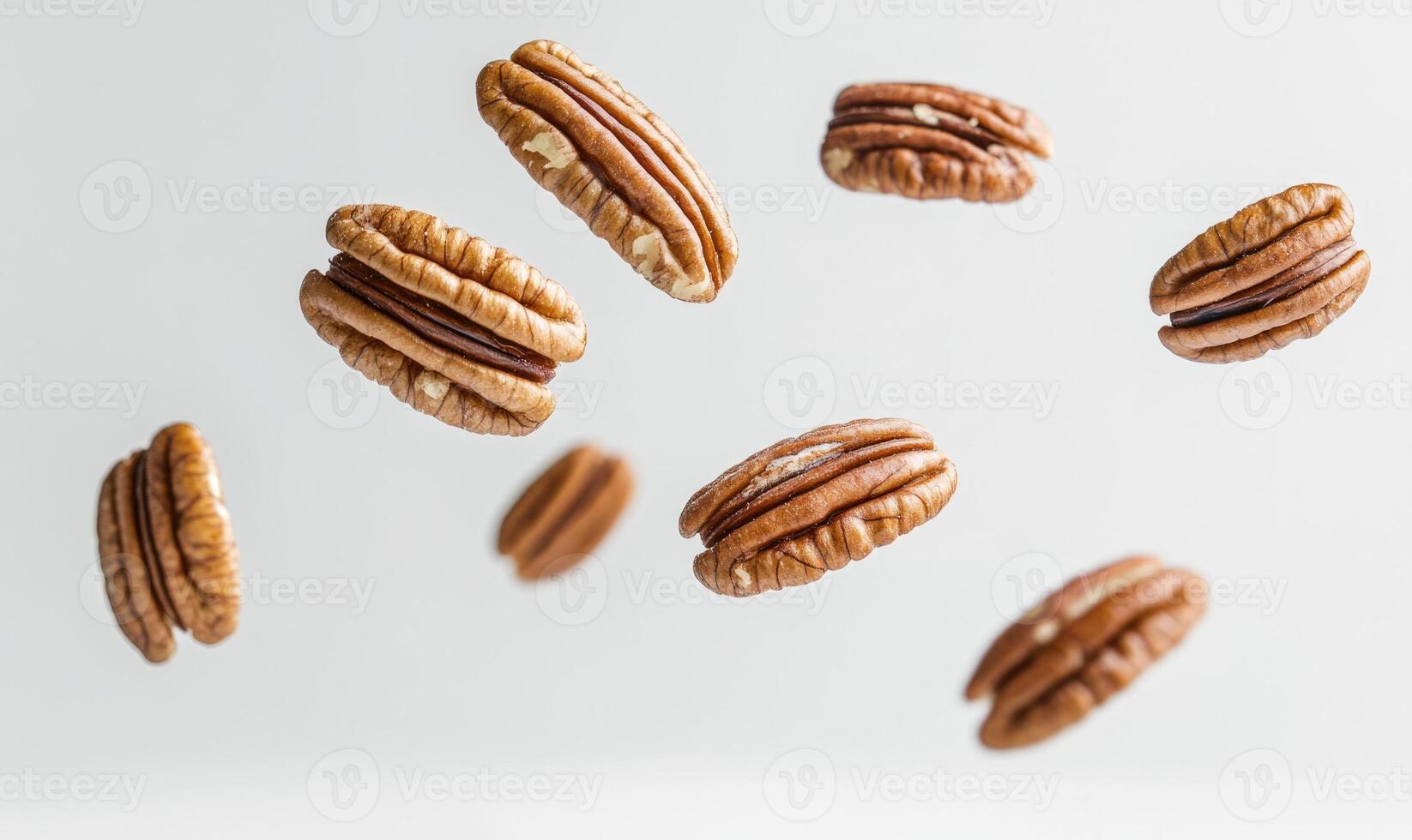 A bunch of nuts are flying through the air photo