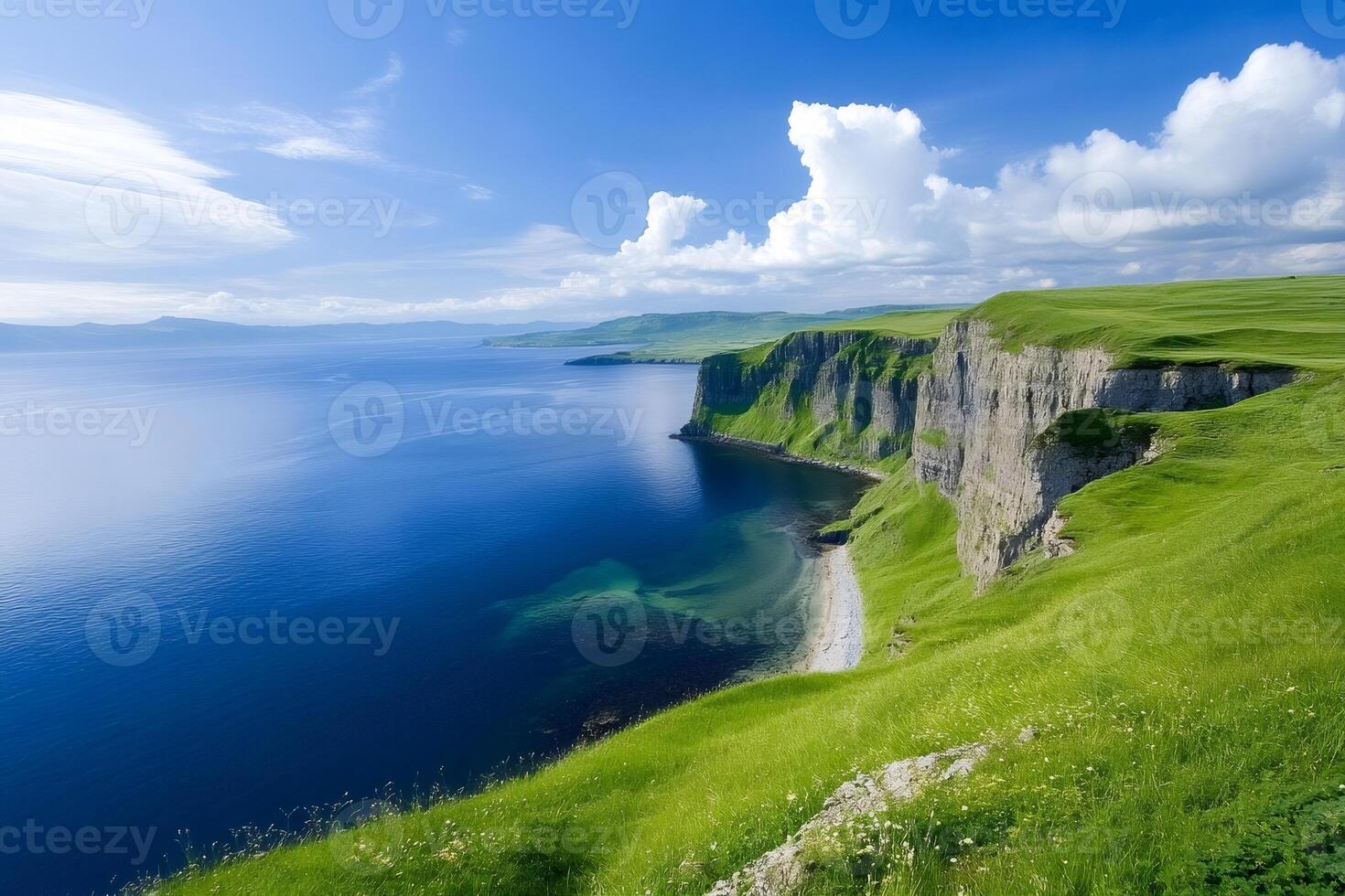 Cliffs of Moher rising above the blue Atlantic Ocean in County Clare, Ireland photo