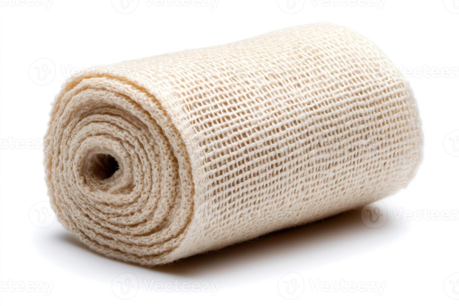 Roll of beige burlap ribbon on white background photo