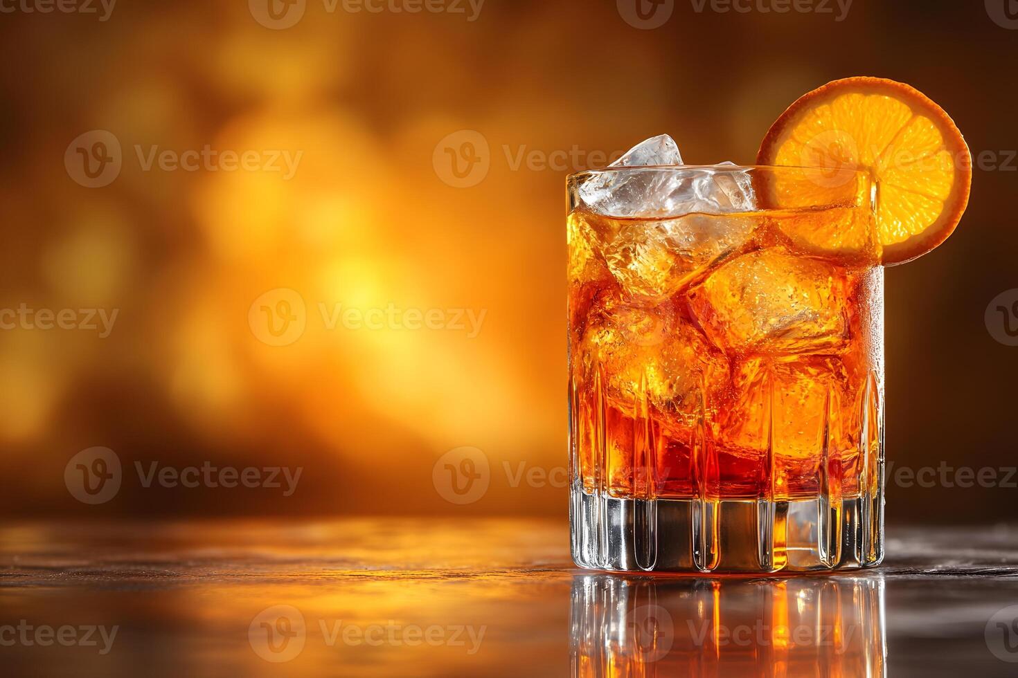 Refreshing Orange Cocktail with Ice Cubes Against Warm Bokeh Background for Beverage Design photo