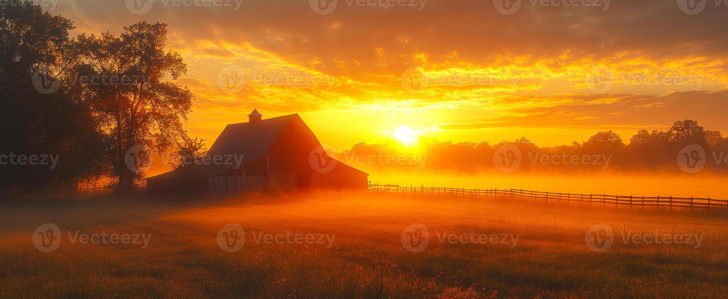 Sunrise over a tranquil farm landscape. A peaceful farm is illuminated by the golden hues of sunrise, surrounded by mist and lush fields in early morning. photo